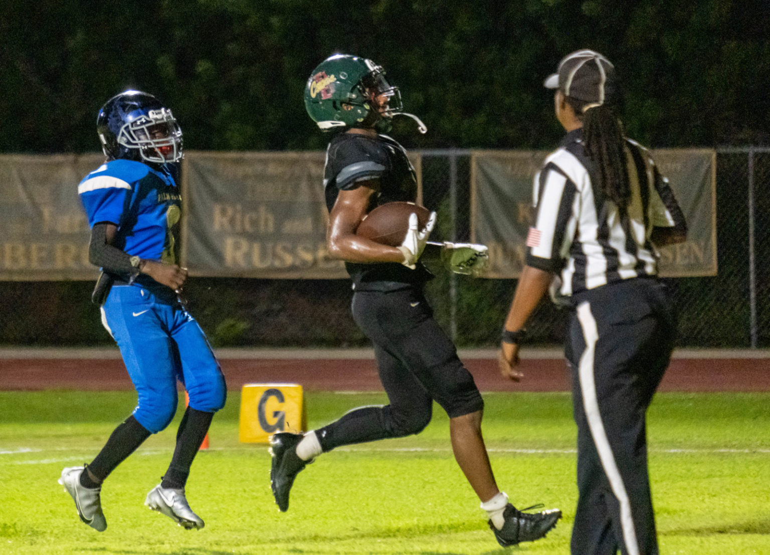 IN PICTURES ’CANES VARSITY FOOTBALL CLOBBERS PALM GLADES