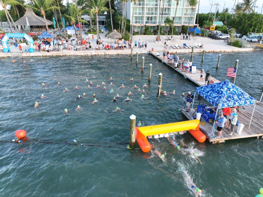 NEARLY 450 SWIMMERS COMPETE IN SWIM TO ICONIC ALLIGATOR LIGHTHOUSE IN