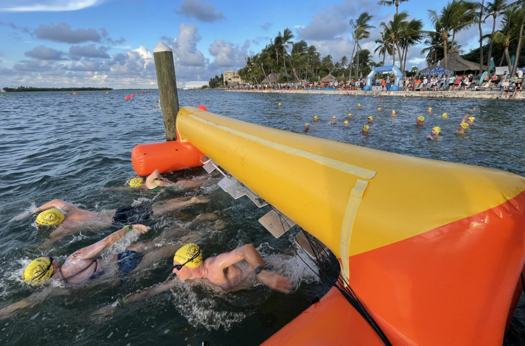 NEARLY 450 SWIMMERS COMPETE IN SWIM TO ICONIC ALLIGATOR LIGHTHOUSE IN