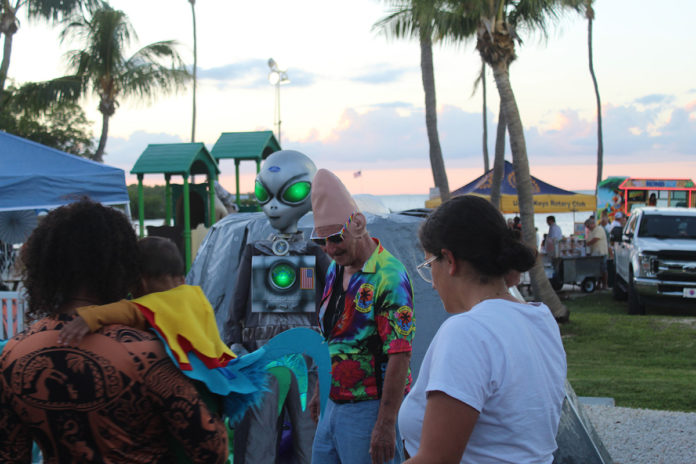 a group of people standing next to each other