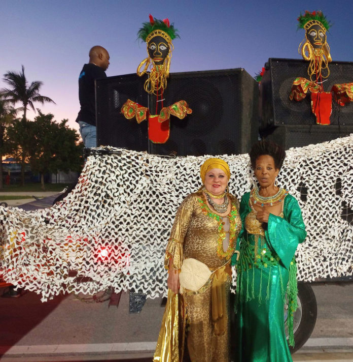 a couple of women standing next to each other