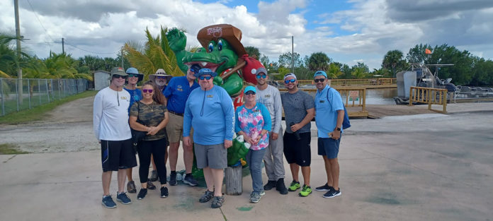 lmc-everglades- a group of people standing next to each other