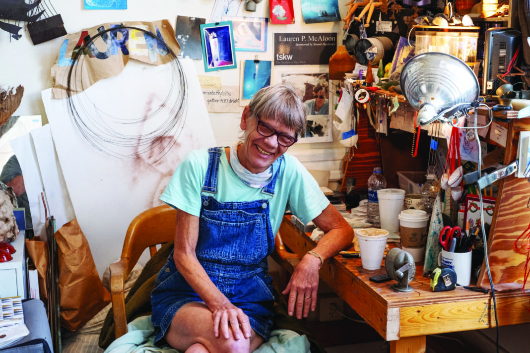 a woman sitting on a chair in a shop