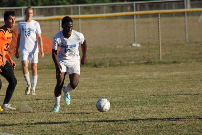 IMG_0094 Large a group of young men playing a game of soccer