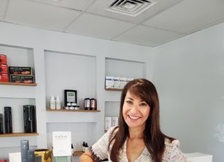 a woman standing in front of a counter