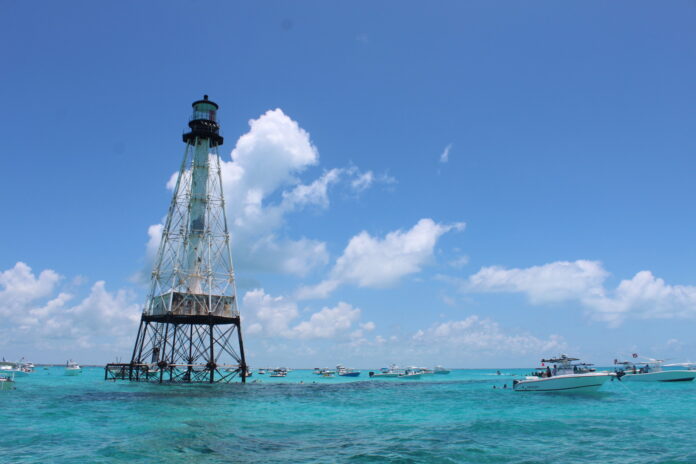 a light house in the middle of the ocean