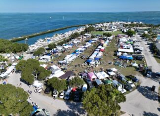 an aerial view of a camp site near the ocean