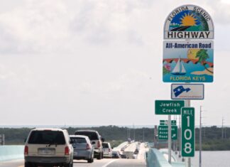a highway sign on the side of a highway