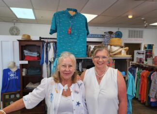 a couple of women standing next to each other