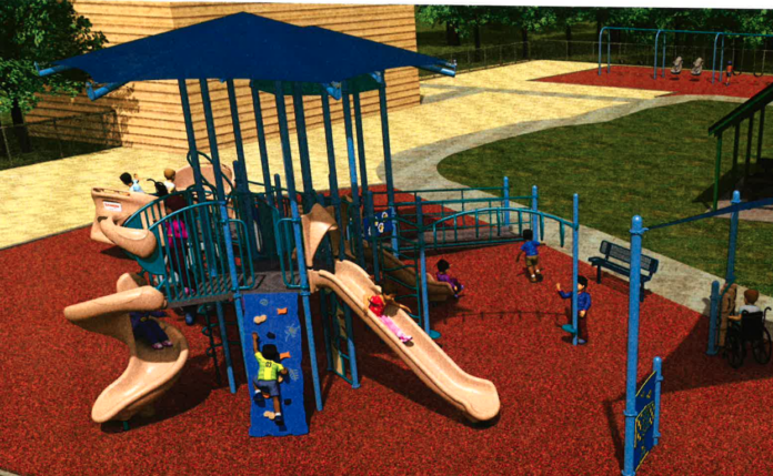 a children's play area with a blue play structure