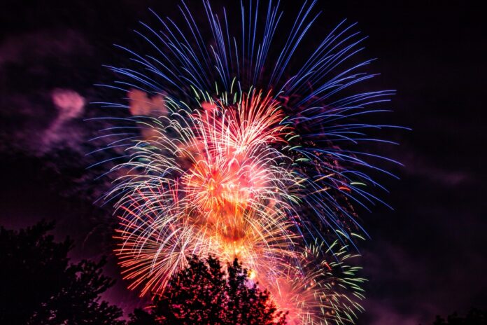 a colorful fireworks display in the night sky