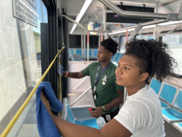 a couple of people that are on a bus