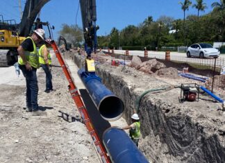 KEYS LOBSTER MINI-SEASON SHUTS LOCAL RAMPS & SUSPENDS ROLLING LANE CLOSURE a couple of men standing next to a large pipe