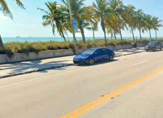ROADWORK TO PROMPT NIGHTTIME CLOSURES ON SOUTH ROOSEVELT BOULEVARD a car driving down a street next to the ocean