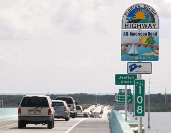 a highway sign on the side of a highway