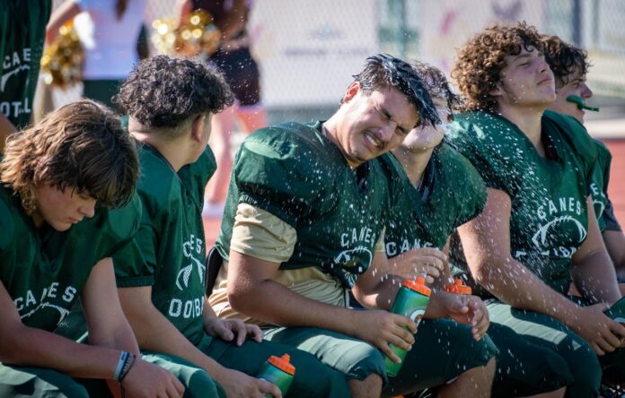 Hurricanes cool off during a steamy practice Large