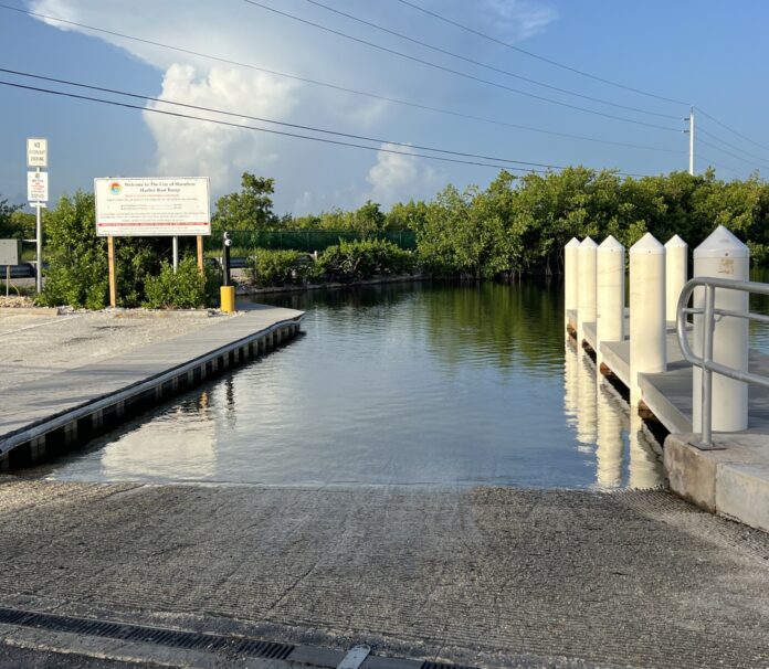 a large body of water next to a road