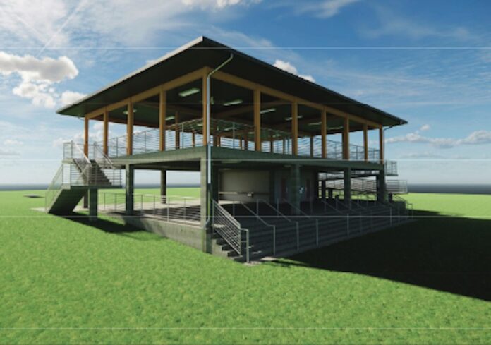 a rendering of a building in a field