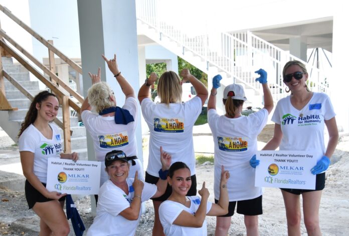 a group of women standing next to each other