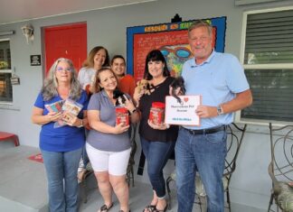 ‘BE LIKE MIKE’ WEEK CELEBRATES THE SPIRIT OF COMMUNITY GIVING a group of people standing in front of a building