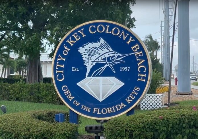 a sign for the city of key colony beach