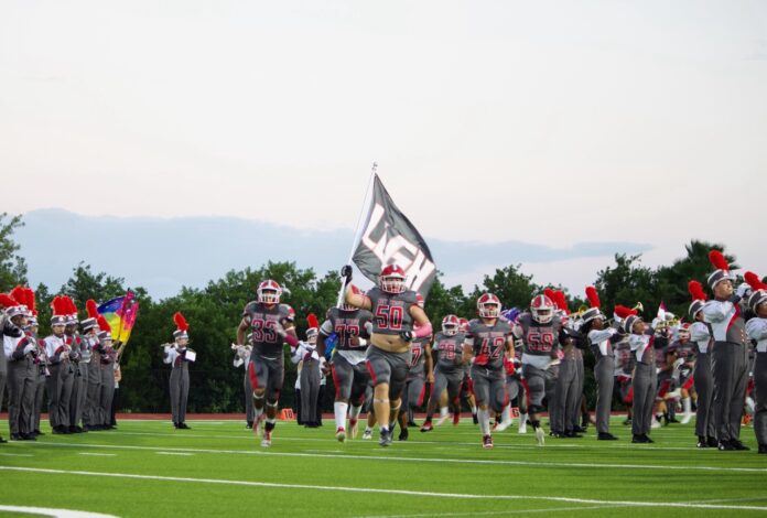 a group of people that are on a field