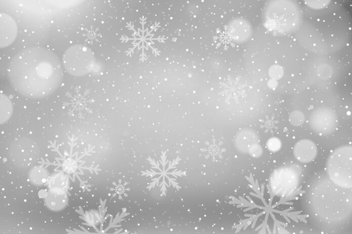 snow flakes are falling down on a black and white background
