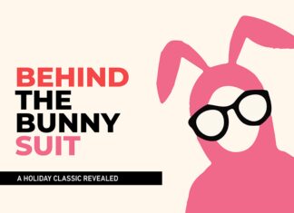 a pink bunny wearing glasses with the words behind the bunny suit