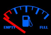 a blue and red fuel gauge with the words empty and full