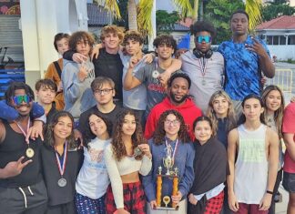 a group of young people posing for a picture