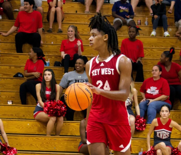 a basketball player dribbling a basketball during a game