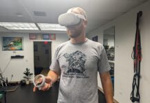 a man wearing a virtual reality headset in a room