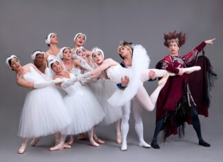 a group of ballerinas posing for a picture