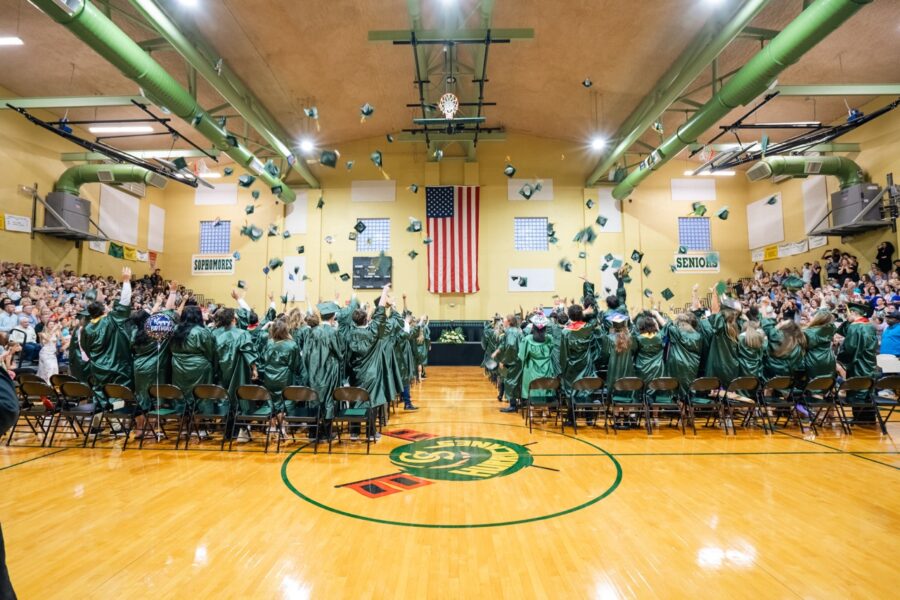 a large group of people in a gym