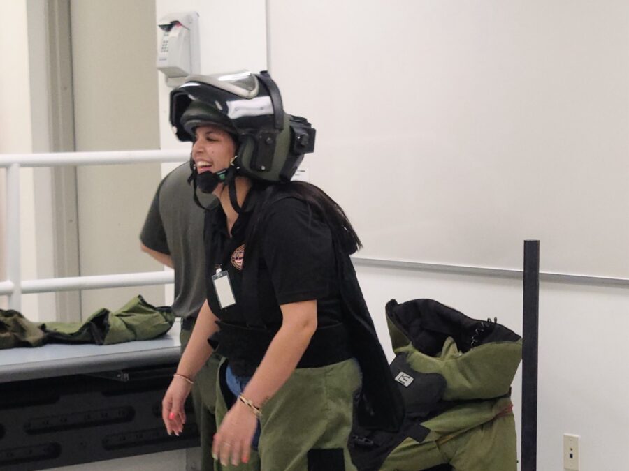 a person wearing a helmet and a backpack