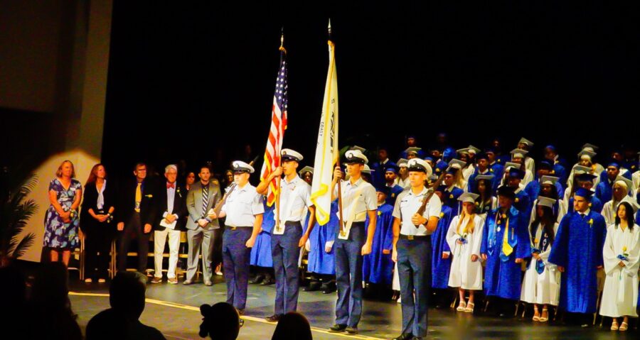 a group of people standing on top of a stage