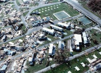 an aerial view of a destroyed parking lot