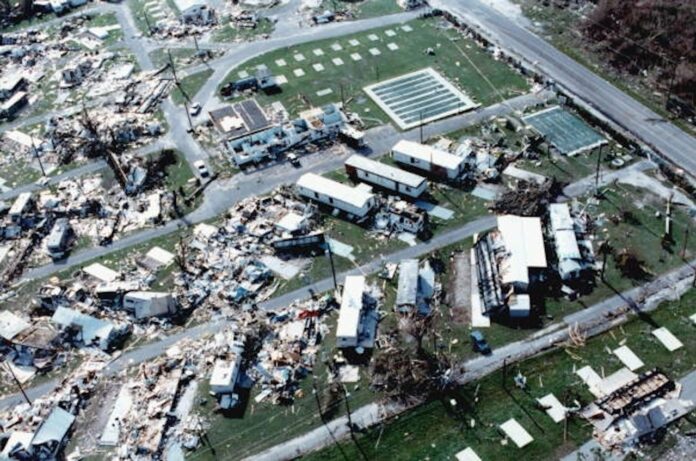 an aerial view of a destroyed parking lot