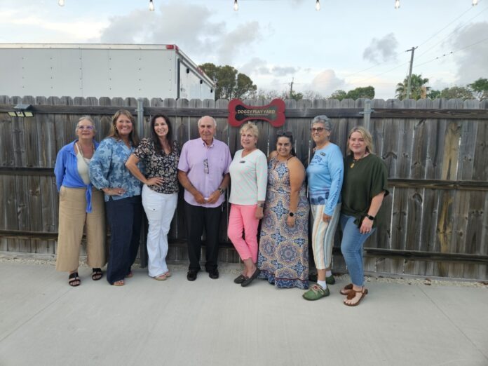 a group of people standing next to each other