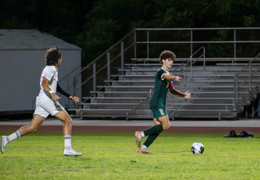 a group of young men playing a game of soccer