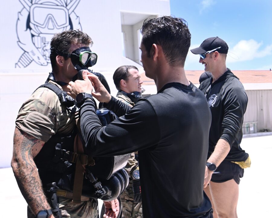 a group of men standing next to each other