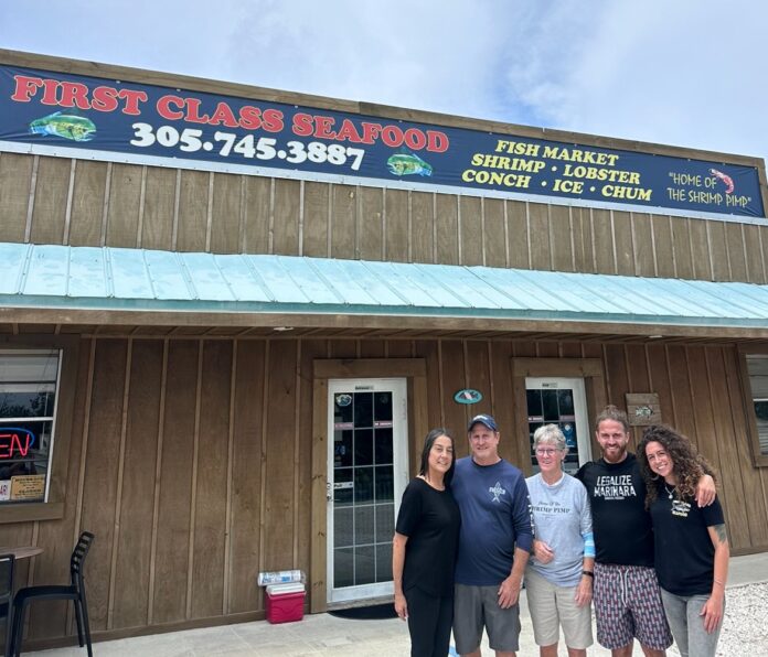 a group of people standing in front of a building