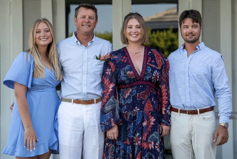 a group of people standing next to each other