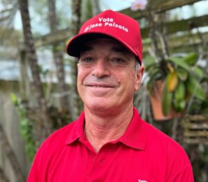 a man in a red shirt and a red hat