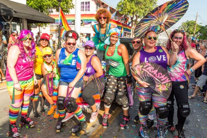 a group of women in roller skate gear posing for a picture
