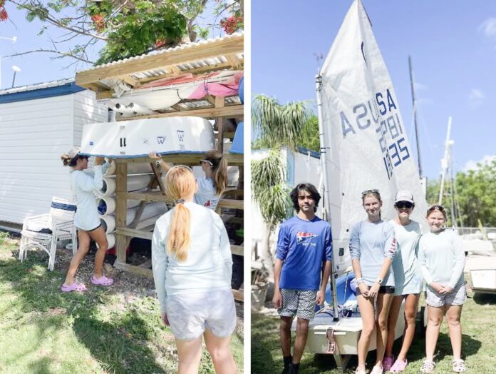 a group of people standing around a boat