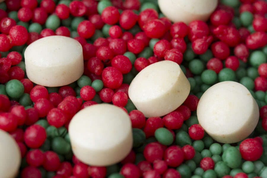 red and green candies and marshmallows in a bowl