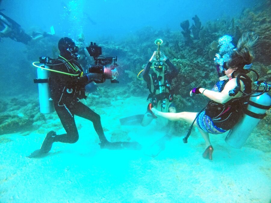 a group of scuba divers in the ocean