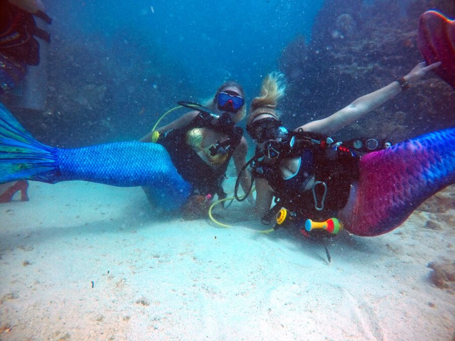 a couple of people that are in the water