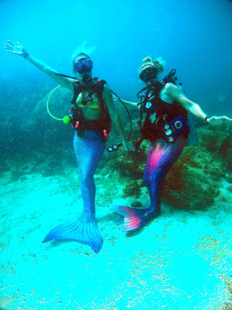 a couple of people that are in the water